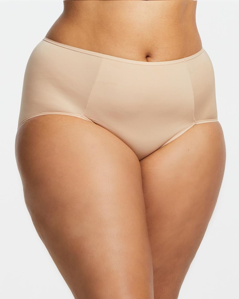 Front of a model wearing a size XL Breanne Smoothing Brief in Sand by Montelle. | dia_product_style_image_id:184939